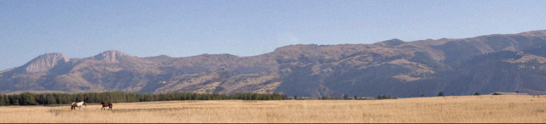 Scenic view of mountains with a clear blue sky